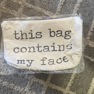 Source Unknown Cream Pouch with Black TextCosmetic Bag